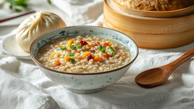 桌面上的中餐包子美食和白粥图片