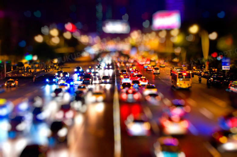 夜景繁华都市来往的车辆景深效果