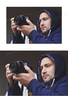 男子手拿相机摄影图片