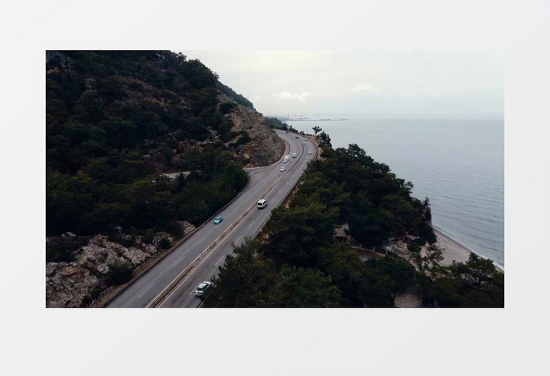 海边山脚下的环山公路交通状况实拍视频素材