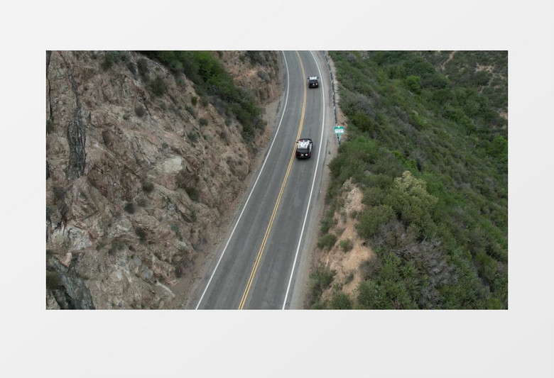 航拍大山景色和半山腰的环山公路实拍视频素材