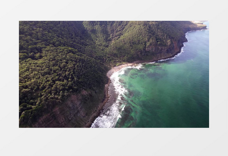 航拍海边的巍峨的高山和森林实拍视频素材