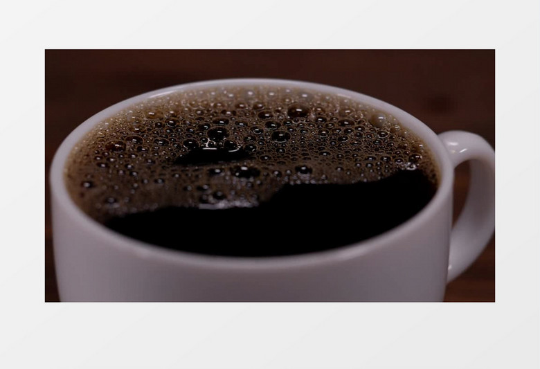 特写拍摄满杯的一杯咖啡实拍视频素材