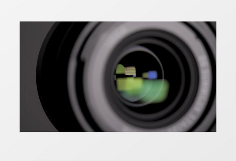反射绿色形状的专业照相机镜头实拍视频素材