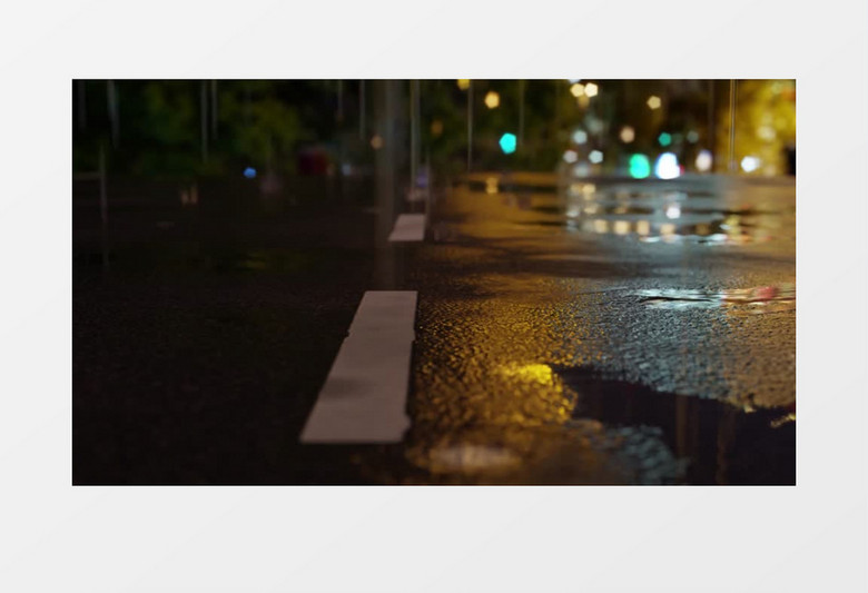 高清实拍夜晚雨滴落在地面实拍视频素材