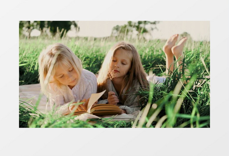 高清实拍女孩草地读书视频素材