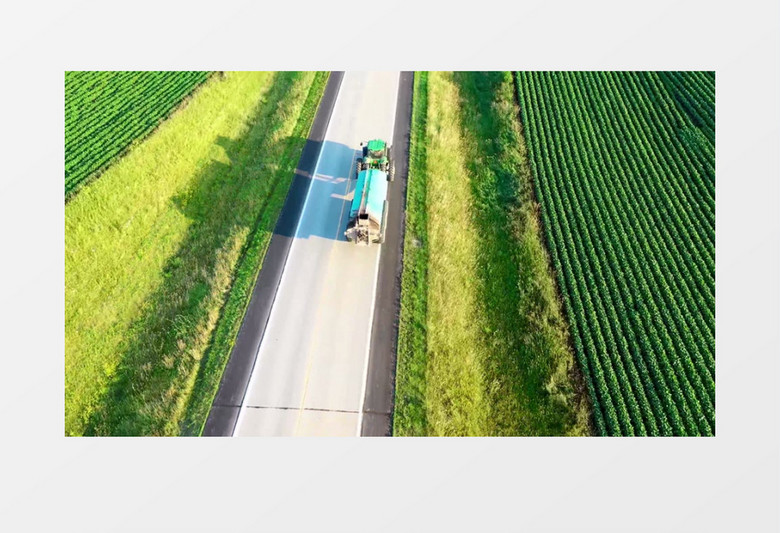 拖拉机拉着罐车在田间道路上行驶实拍视频素材
