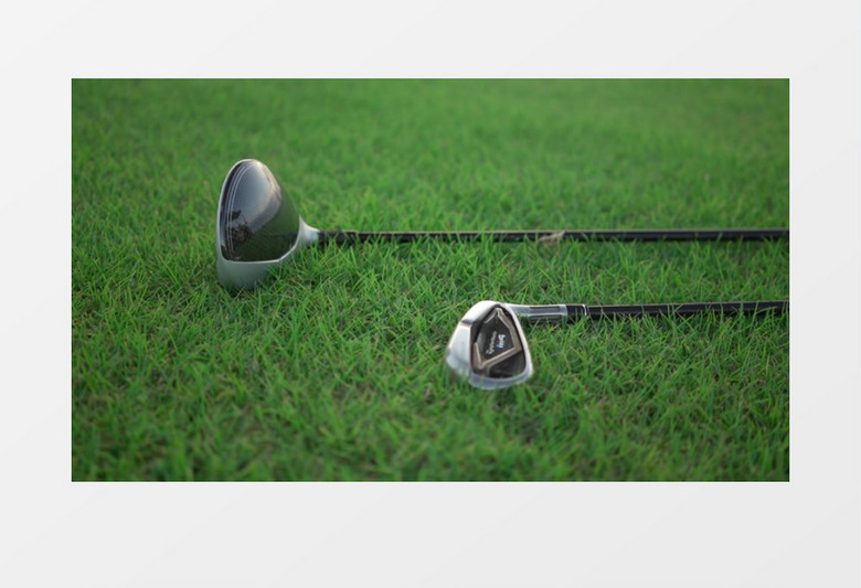 高尔夫球杆平躺在草地上实拍视频素材
