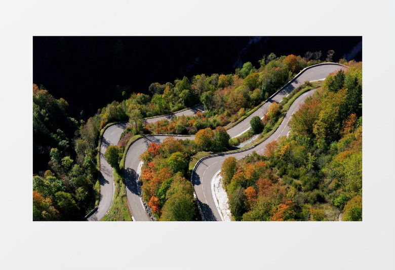 俯拍环形盘山公路和路边的景色实拍视频素材