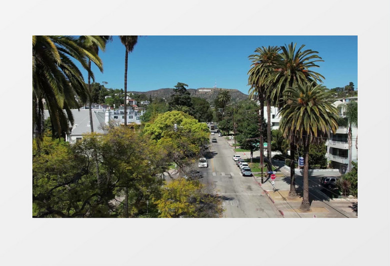 航拍山脚下的道路交通状况实拍视频素材