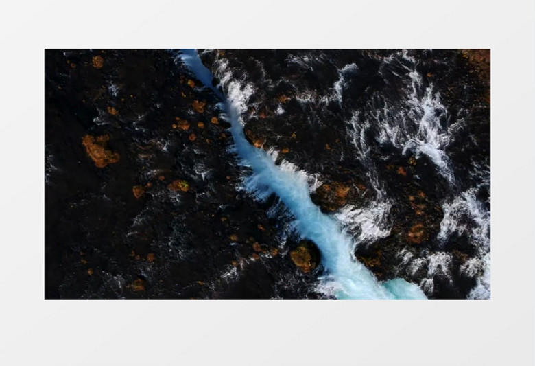 航拍山脚下潺潺流动的溪水实拍视频素材