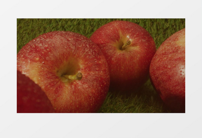 新鲜的红苹果上喷水实拍视频素材