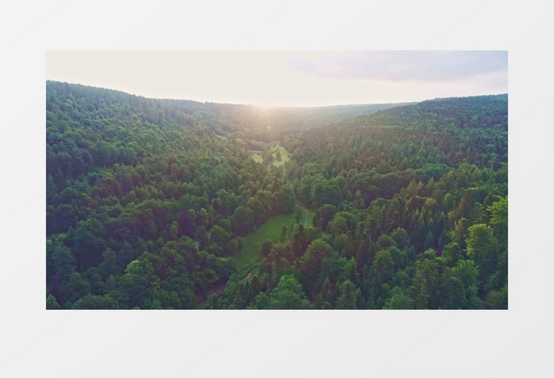 航拍阳光照射下的山林实拍视频素材