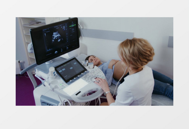 医生使用B超机给孕妇做检查实拍视频素材
