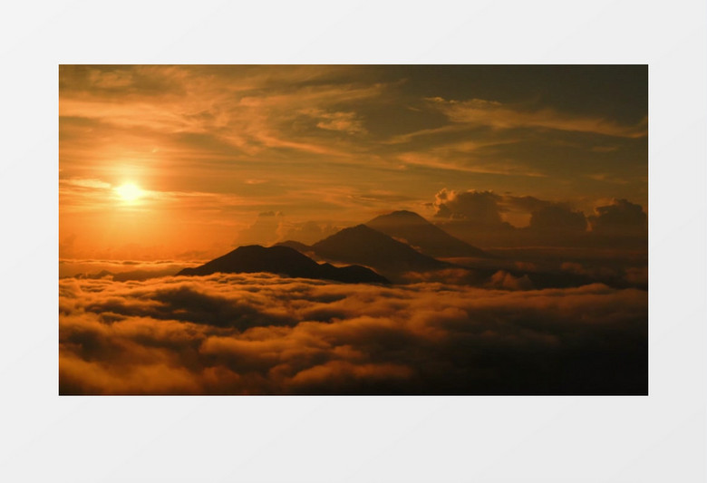 太阳将山顶及山顶的云层照耀成金黄色实拍视频素材