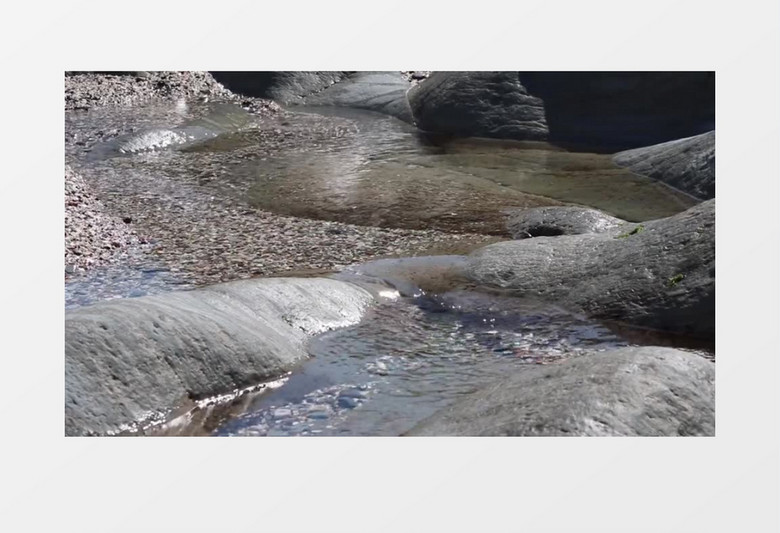 小溪边涔涔流动的水实拍视频素材