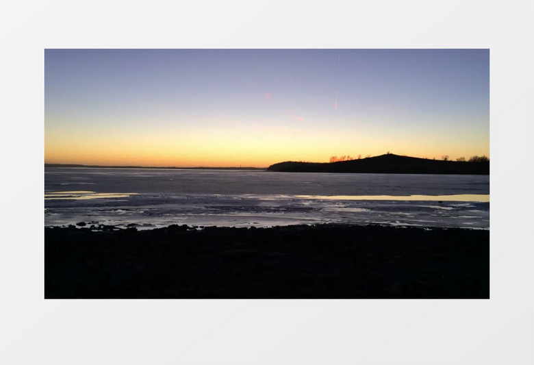 海岸落日黄昏儿童骑单车侧影实拍视频