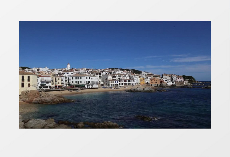 高清西班牙小镇海边海滩度假国旗飘扬餐厅午餐实拍视频素材