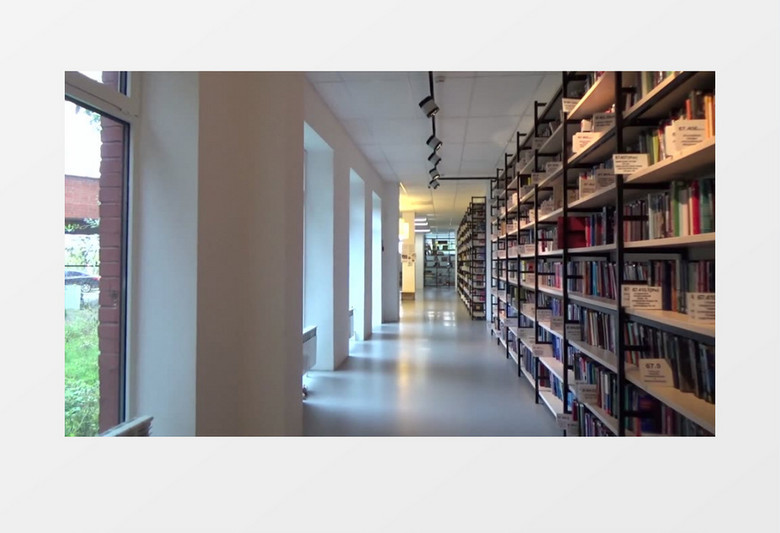 高清移动拍摄学校图书馆阅读室书籍实拍视频素材