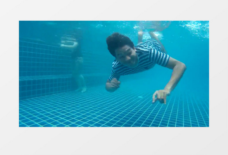 高清拍摄泳池水底男人游泳实拍视频素材