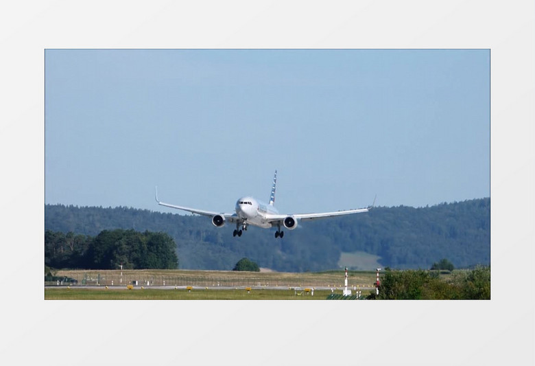 白天喷气式飞机降落机场跑道实拍视频素材